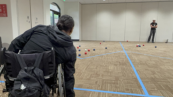 Woman playing boccia ball
