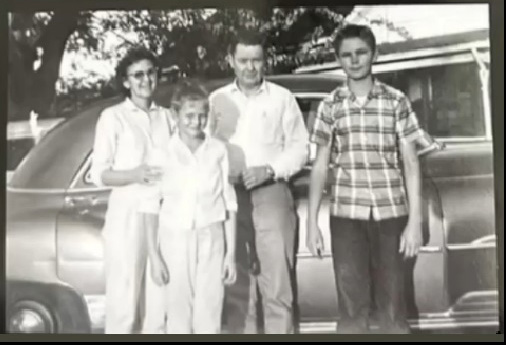 Black and white picture of Leo “Buddy” Pergson and family